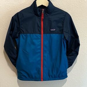 Patagonia Reversible Two-Tone Blue Jacket with Red Accent and fleece lining